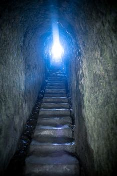 An image of a light at the end of the tunnel
