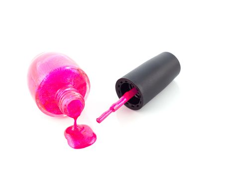 Pink nail polish on white background, selective focus