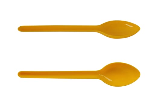 Isolate plastic yellow spoon on white background