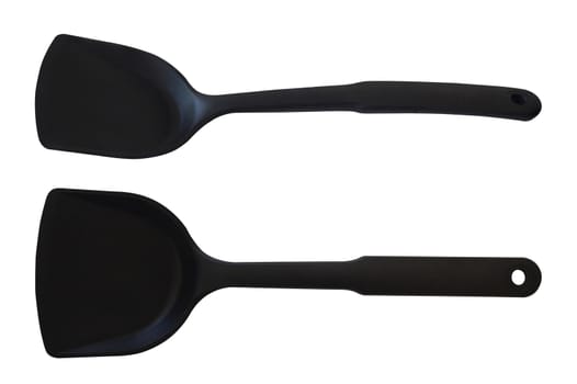 Isolate black plastic spoon, turner on white background