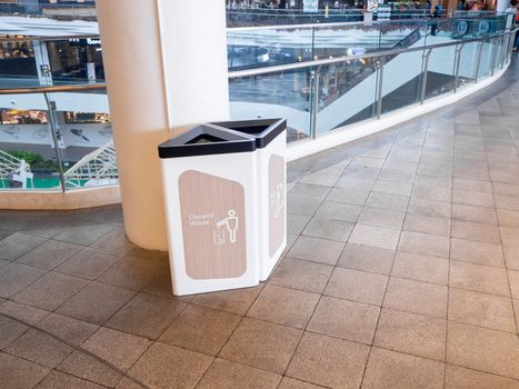 recycling bin at shopping mall, trash container with icons of recycle