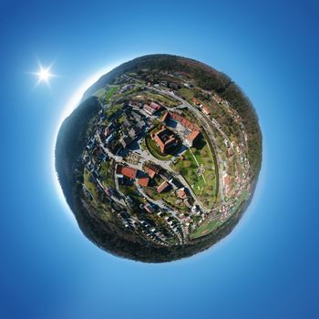 An image of a little planet panorama of the beautiful water castle at Glatt Germany