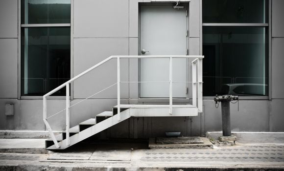 escape stairs and door on the outside of a modern building