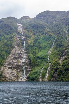 An image of a waterfall at Doubtful Sound Fiordland National Park New Zealand