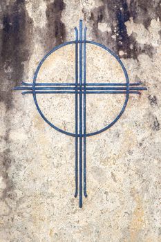 An image of a cross at a grave stone