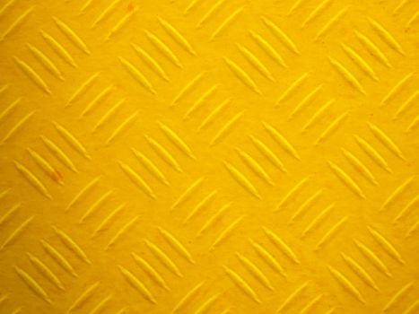 Illustration of a yellow painted diamond metal plate texture