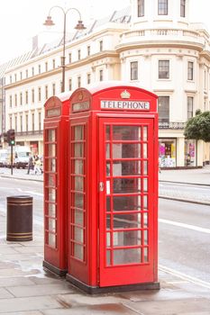 An image of famous red phone boxes in London