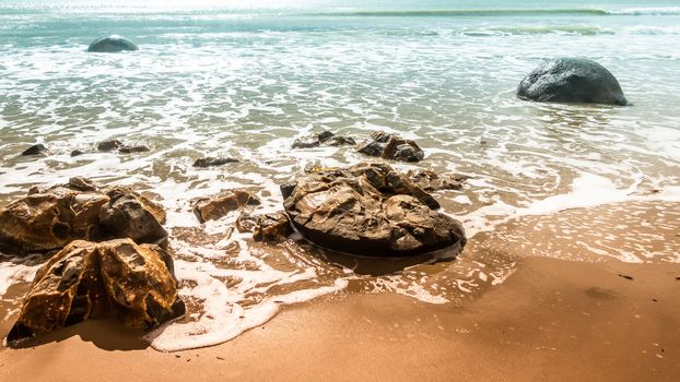 An image of the boulders at the beach of Moeraki New Zealand