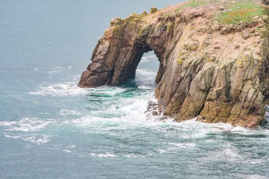 A photography of a rough coast in cornwall