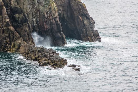 A photography of a rough coast in cornwall