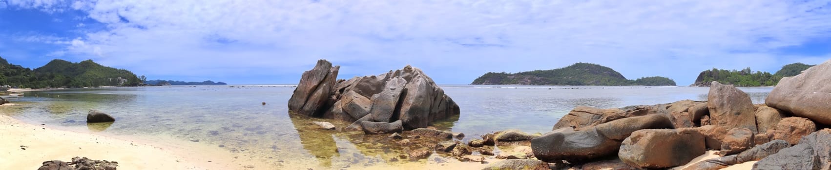 Stunning high resolution beach panorama taken on the paradise islands Seychelles.