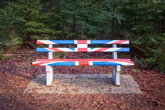 An image of a bench in Great Britain Union Jack flag colors