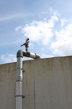 An image of a silo pipe blue sky background