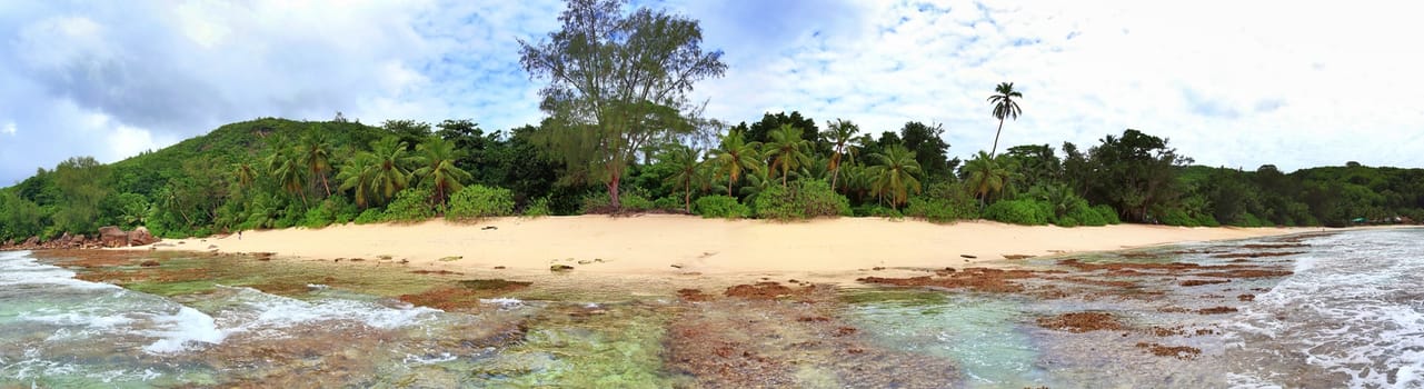 Stunning high resolution beach panorama taken on the paradise islands Seychelles.