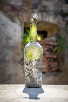 An image of a dirty old wine bottle