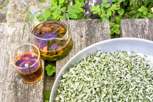 A verbena tea on old wooden planks