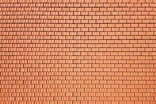 An image of a red brick wall background