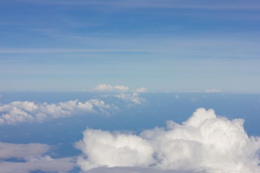 Sky and clouds bird's eye view on the plane