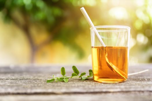 A verbena tea on old wooden planks