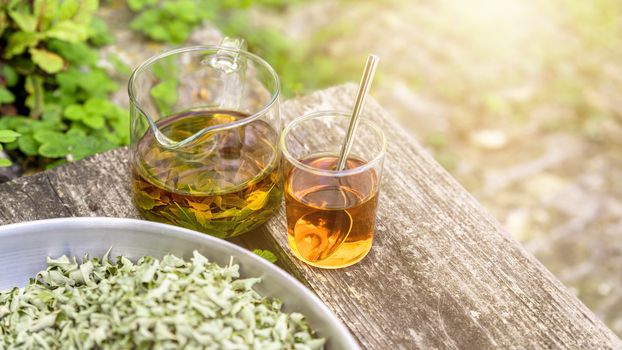 A verbena tea on old wooden planks