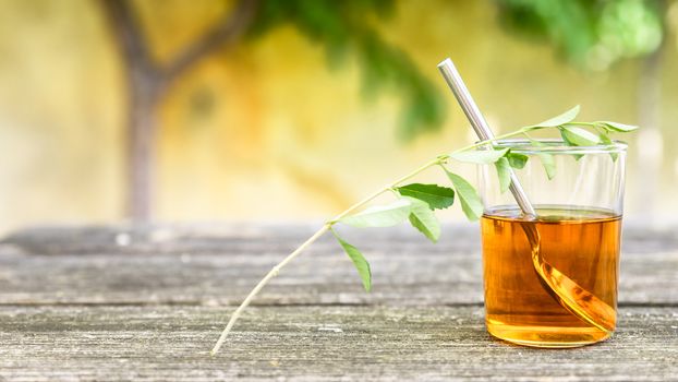 A verbena tea on old wooden planks