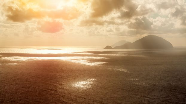 An image of the active volcano islands at Lipari Italy sunset