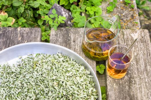 A verbena tea on old wooden planks