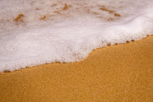 An image of a sandy beach shore line texture background