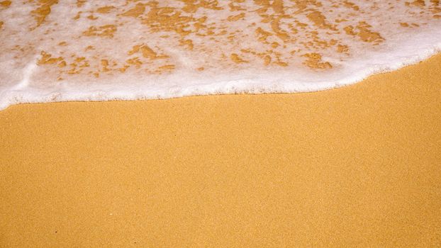 An image of a sandy beach shore line texture background