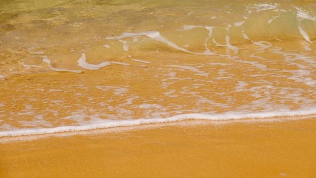 An image of a sandy beach shore line texture background