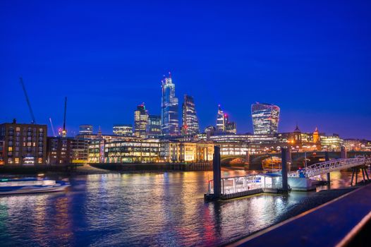 A view of the London skyline across the River Thames in London, UK.