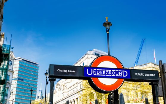 London, United Kingdom - April 17, 2019 : Signs leading to the entrance on the London Underground public subway station in London, England.