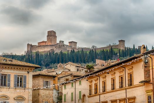 View of Rocca Maggiore, medieval fortress dominating the city of Assisi, one of the most beautiful medieval towns in central Italy