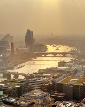 The River Thames in London, UK at dusk.