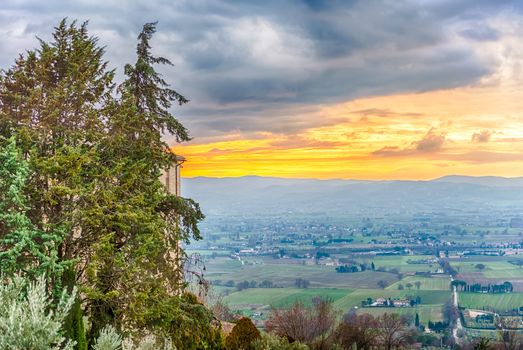 Scenic sunset as seen from Assisi, on the western flank of Monte Subasio, Italy