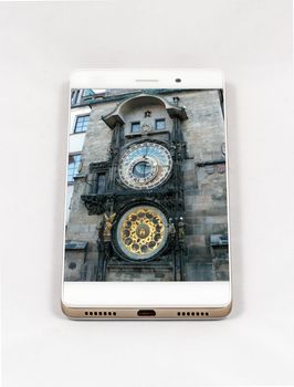 Modern smartphone with full screen picture of the iconic Prague Astronomical Clock, Czech Republic. Concept for travel smartphone photography. All images in this composition are made by me and separately available on my portfolio