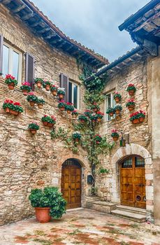 Historical buildings in the old city center of Assisi, one of the most beautiful medieval towns in central Italy