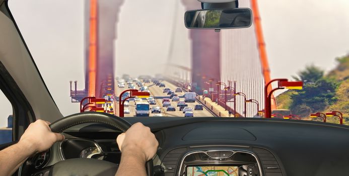 Driving a car towards the traffic on the Golden Gate Bridge in San Francisco, USA