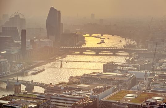 The River Thames in London, UK at dusk.