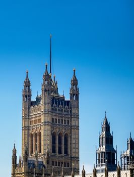 British Parliament along the River Thames on a sunny day in London, UK.