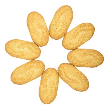 Flower shape made of tasty biscuits on white background with clipping path