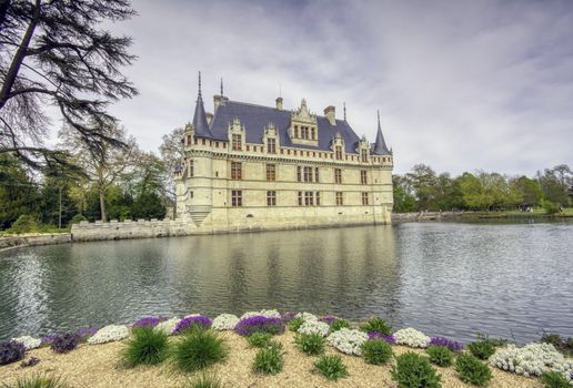 Azay le Rideau, France - April 17,2019: Chateau d'Azay-le-Rideau in Loire Valley, France. Castle of Azay-le-Rideau is one of the travel destinations in Europe. Scenic view of the French castle in spring.