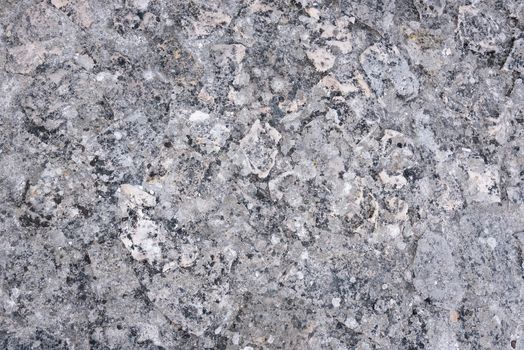 Detailed grey rocky texture as natural background