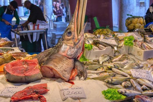 Venice, Italy - October 12, 2019: Fresh seafood for sale at the Rialto farmers market ,Mercato di Rialto, in Venice near the Rialto Bridge and the Grand Canal.