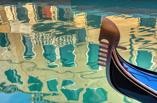 Venice gondola and reflection of buildings in water,Venice,Italy