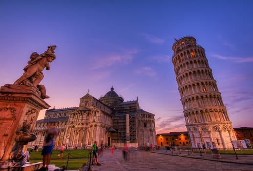 Pisa, Italy - July 8, 2018: Piazza dei miracoli, with the Basilica and the Leaning Tower, Pisa, Italy.