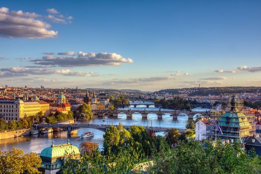 Charles bridge, Karluv most and Lesser town tower, Prague in spring at sunrise, Czech Republic.