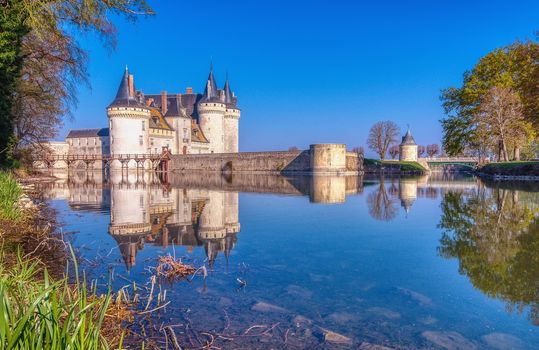 Sully Sur Loire, France - April 14, 2019: Famous medieval castle Sully sur Loire, Loire valley, France. The chateau of Sully sur Loire dates from the end of the 14th century and is a prime example of medieval fortress.