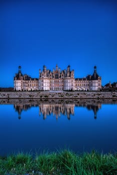 Loire, France - April 14, 2019: The castle of Chambord at night, Castle of the Loire, France. Chateau de Chambord, the largest castle in the Loire Valley. A UNESCO world heritage site in France