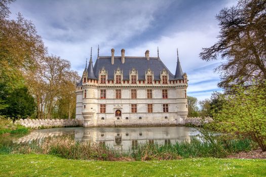 Azay le Rideau, France - April 17,2019: Chateau d'Azay-le-Rideau in Loire Valley, France. Castle of Azay-le-Rideau is one of the travel destinations in Europe. Scenic view of the French castle in spring.